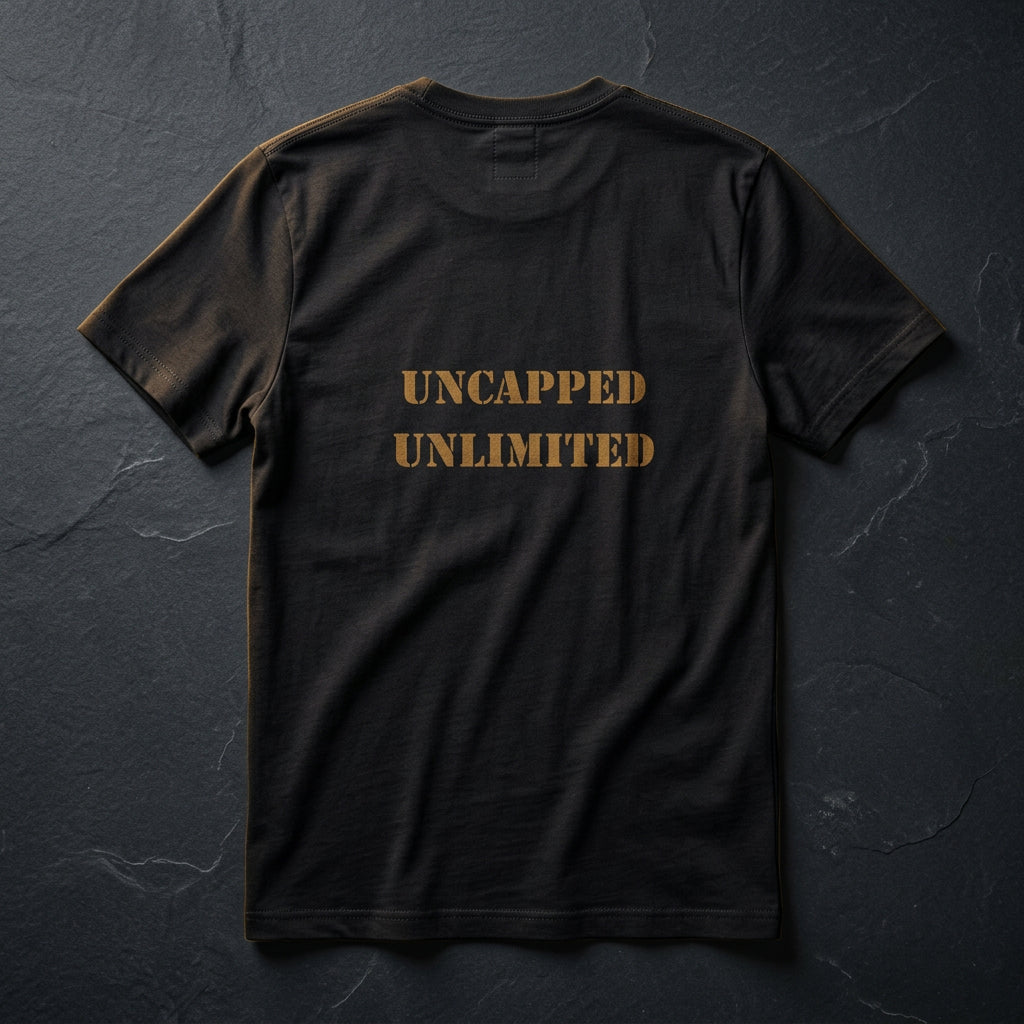 Wild Well Tee — back view with gold 'Uncapped Unlimited' stenciled print